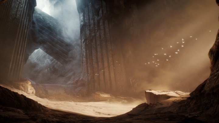 Image of a large temple surrounded by sand